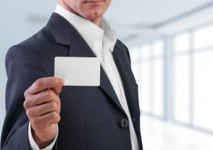 Business Card. Businessman showing his business card