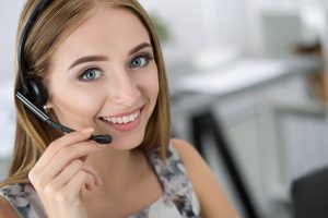 Portrait of beautiful call center operator at work