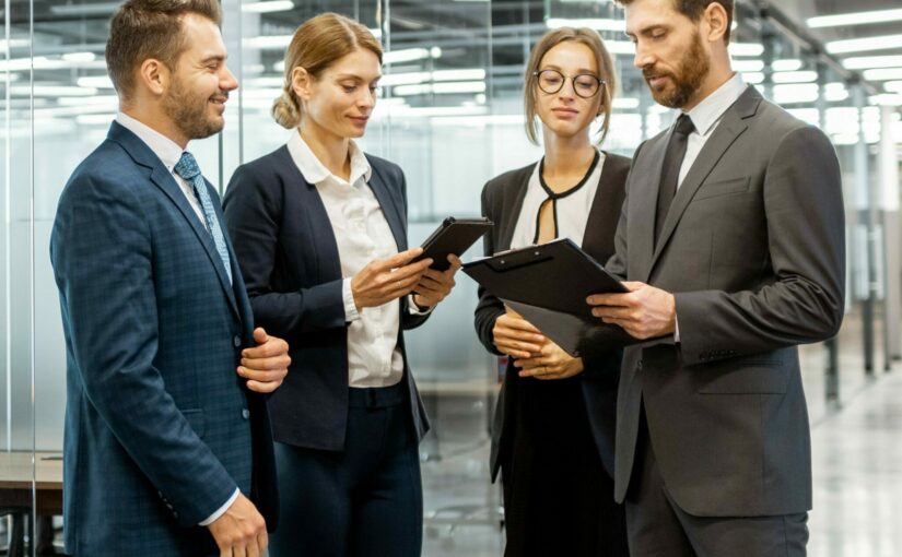 Group of business people in the hallway