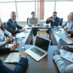 A business meeting with participants following good meeting etiquette.