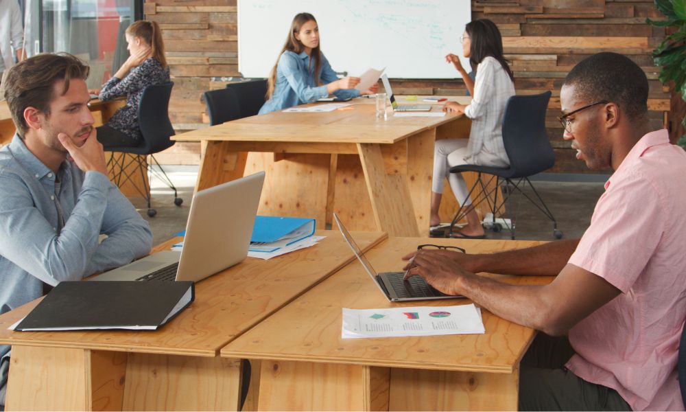 Team hot desking at a shared workspace.