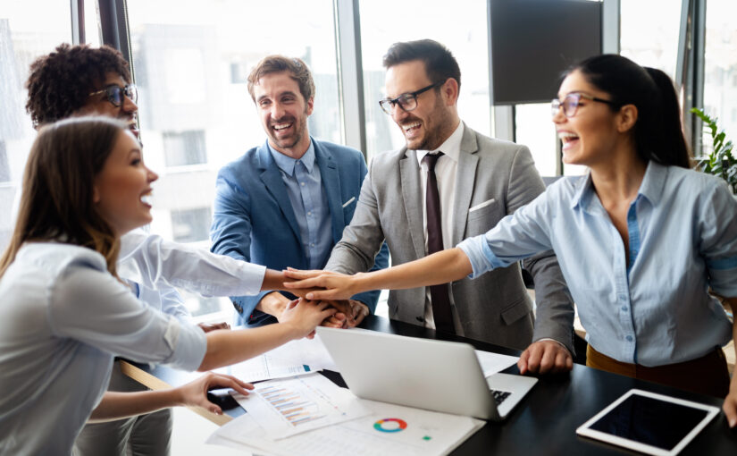 High-performing teams collaborating in a professional meeting room