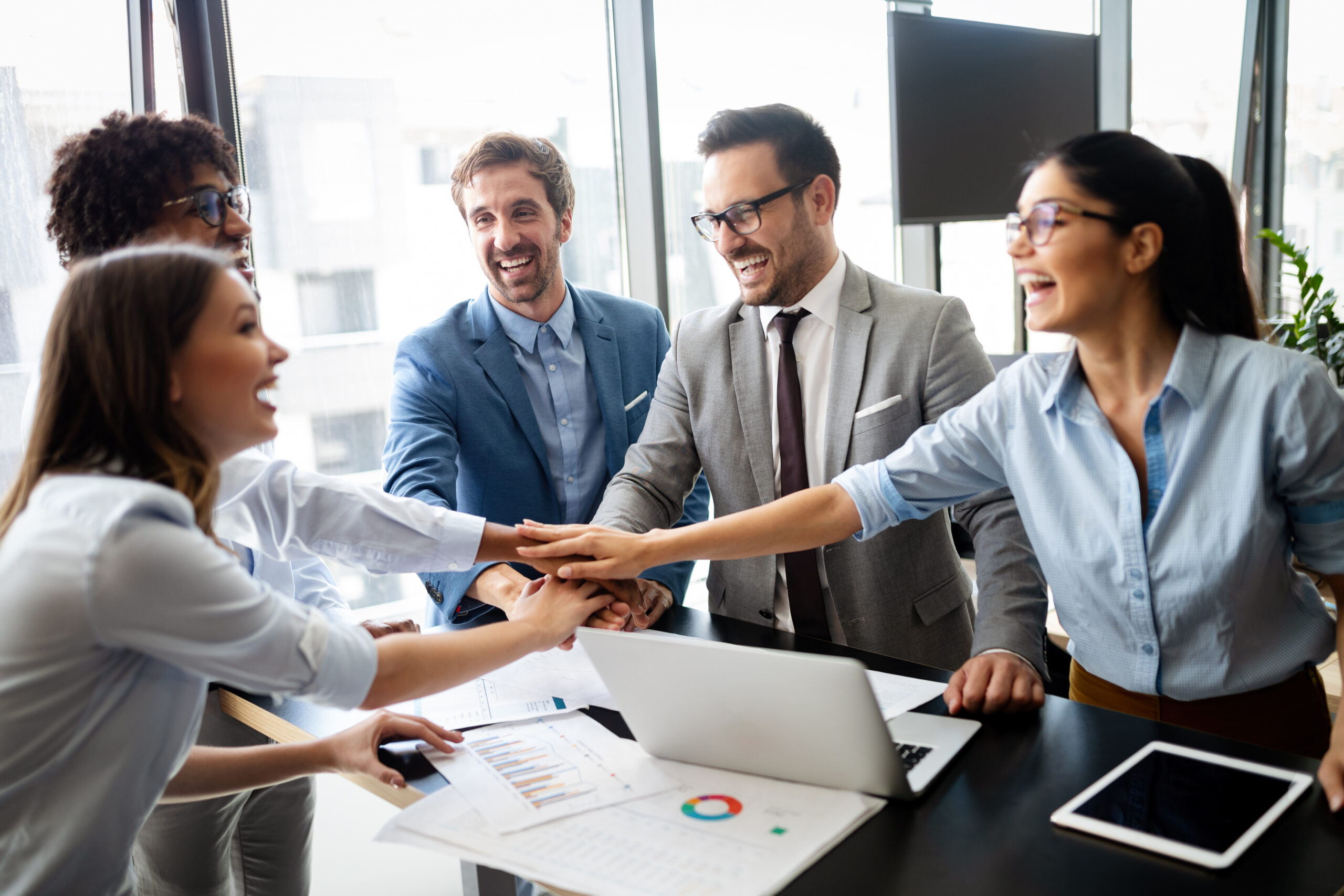 High-performing teams collaborating in a professional meeting room